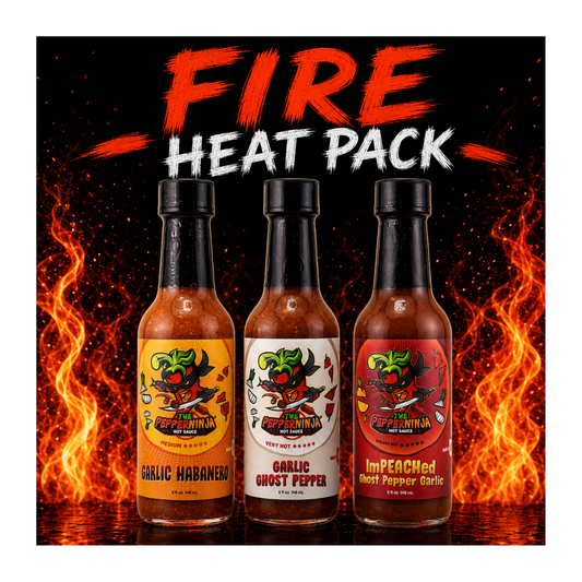 Three bottles of hot sauce labeled Garlic Habanero, Garlic Ghost Pepper, and Impaled Hot Pepper Garlic, grouped under a large 'FIRE HEAT PACK' title with fiery graphics on a black background.