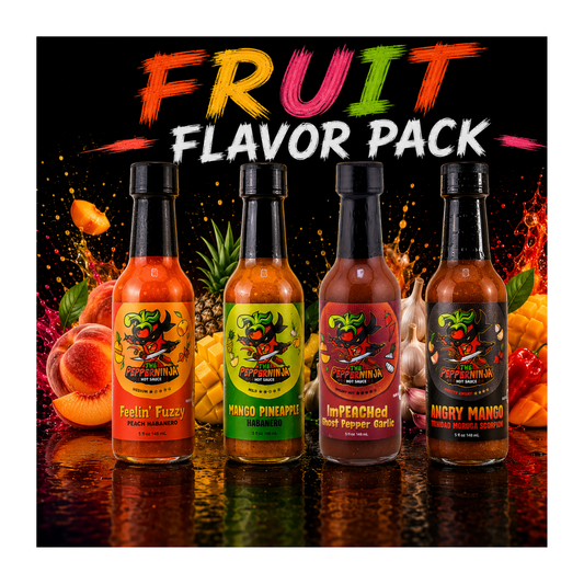 Four bottles of Pepperminia hot sauces lined up against a dark, vibrant fruit-themed background with the text 'FRUIT FLAVOR PACK' at the top. The bottles contain orange, yellow-green, red, and dark brown sauces and are labeled with flavors: Feelin' Fuzzy, Mango Pineapple, Impaled Hot Pepper Sauce, and Angry Mango.