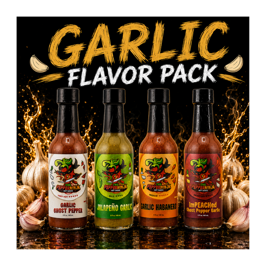 Four bottles of garlic-flavored hot sauce arranged on a reflective dark surface with garlic bulbs around them and large 'GARLIC FLAVOR PACK' text above. The bottles have black caps and colorful labels in white, green, orange, and red, with visible brands including Hot Shot Pepper Company.