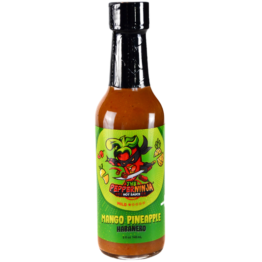 Bottle of Mango Pineapple Habanero hot sauce with a green label on a white background